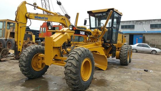 Chiny 7,2 l Pojemność 17510 kg Caterpillar 140K Używana równiarka samobieżna dostawca